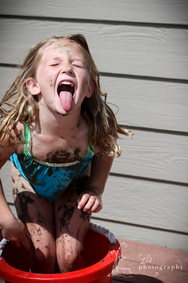 Playing and laughing in the mud