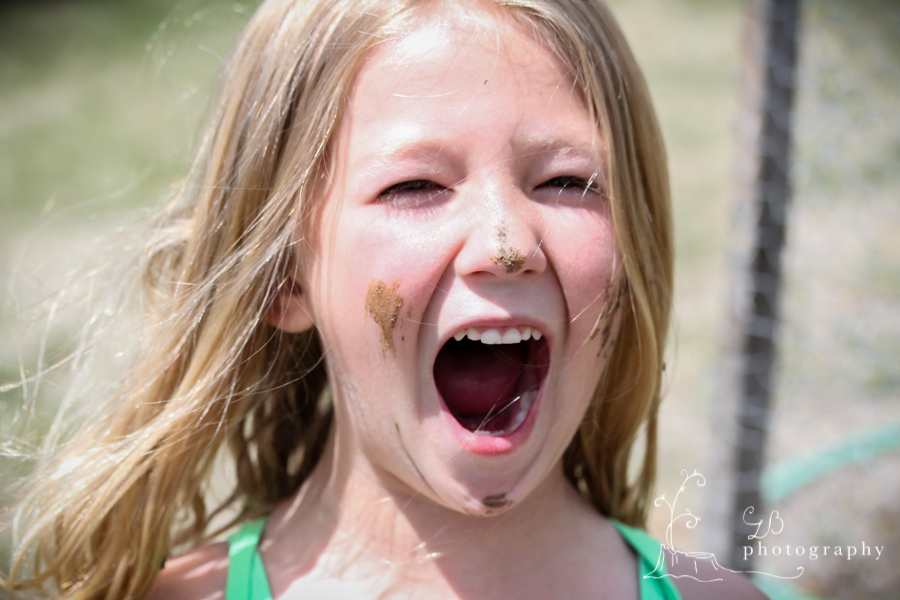 Playing and laughing in the mud